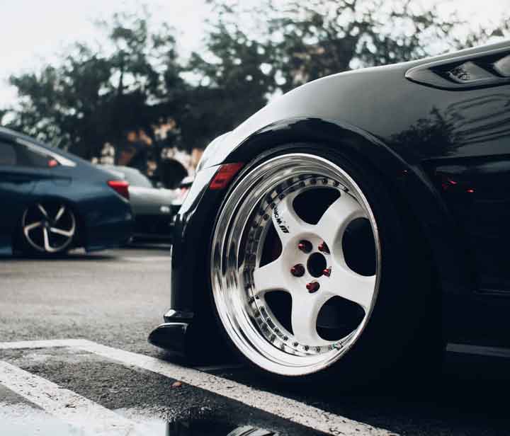 white alloy rims on lowered vehicle